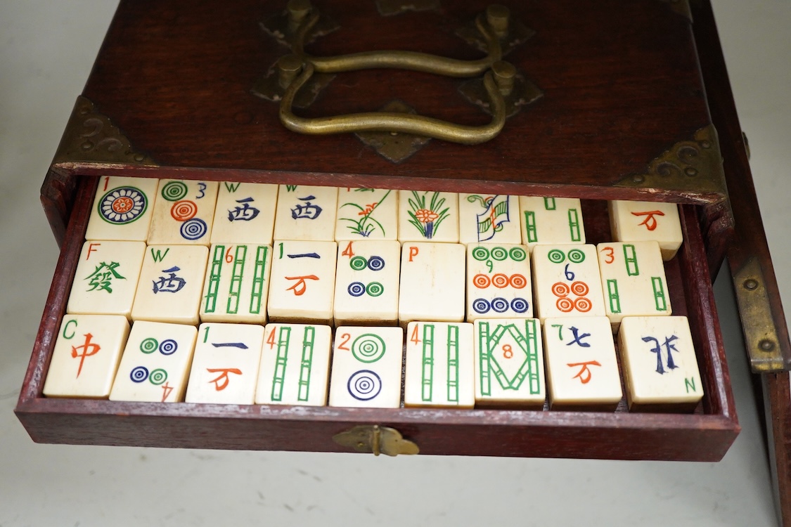 An early 20th century Chinese cased mah jong set, 20cm wide x 17cm high